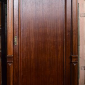 Armario de una puerta en madera de caoba y palosanto